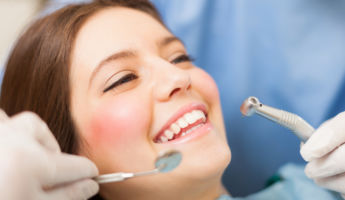 Woman receiving a dental treatment